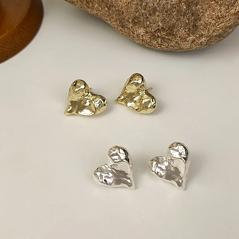 

Silver Needle Light Luxury Premium Metal Heart Simple Versatile Cold Style Irregular Wrinkled Women Earrings Wholesale Ear Rings