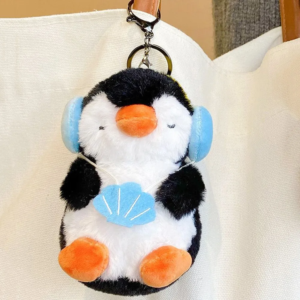 Écouteurs en peluche Pingu, porte-clés en peluche, dessin animé, téléphone drôle, poupée Pingu, pendentif doux et mignon, jouet pingouin en peluche, cadeau de Couple