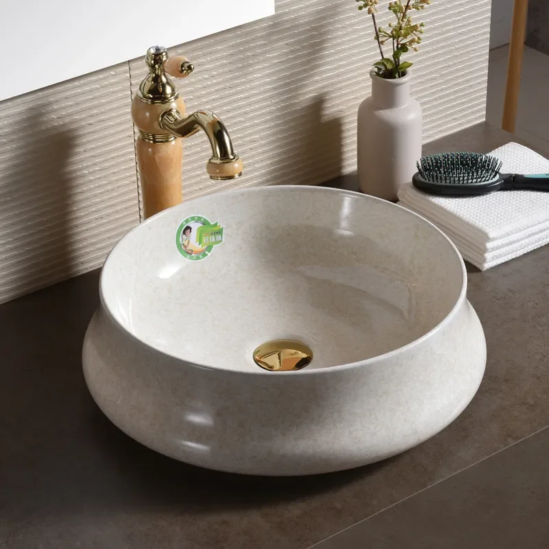 Modern Oval Ceramic Washbasin High Gloss Pearl Glaze Bathroom Sink Elegant Countertop Basin for Home Hotel Decoration