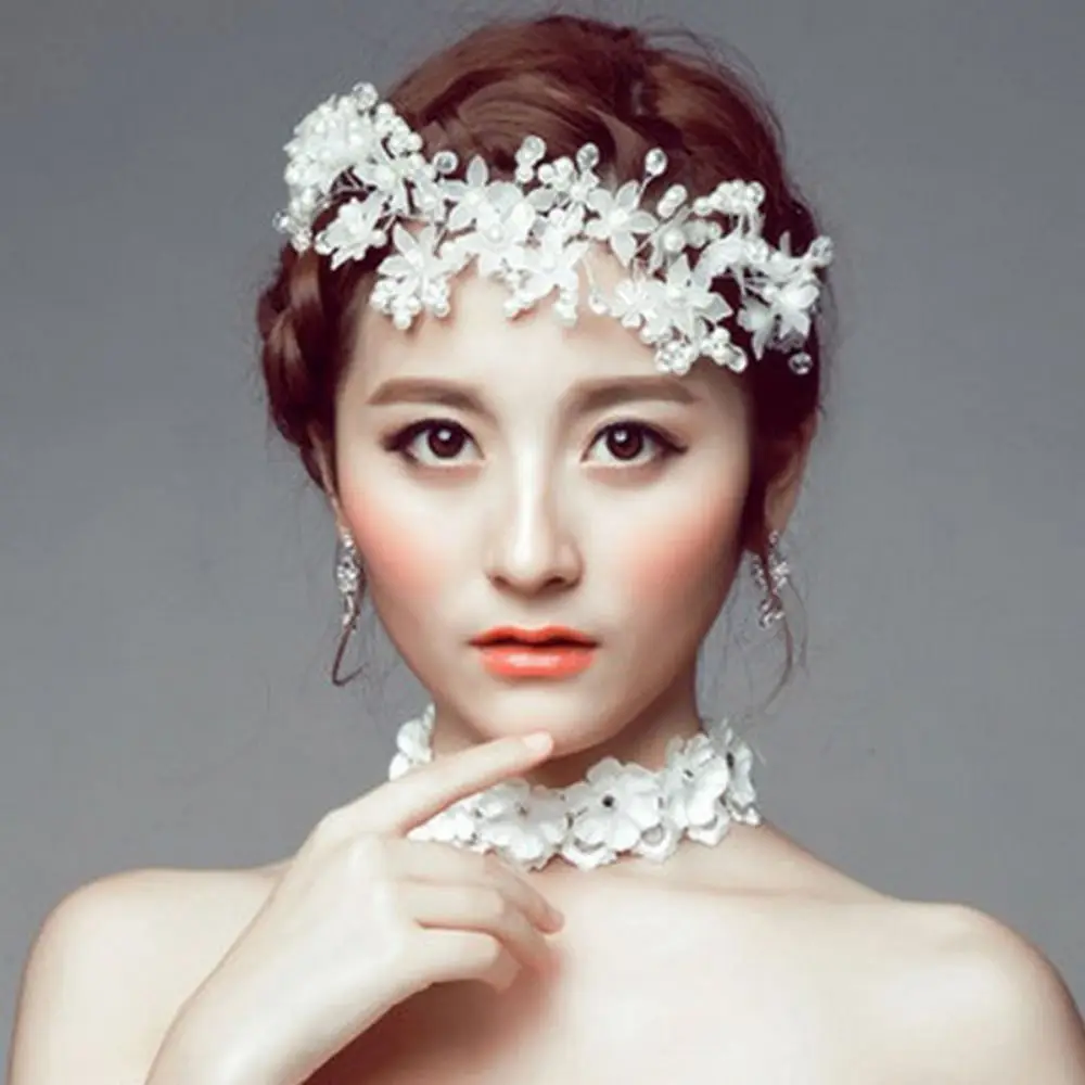 

Изысканный свадебный головной убор: роскошные заколки с кисточками, жемчугом и цветами для невесты