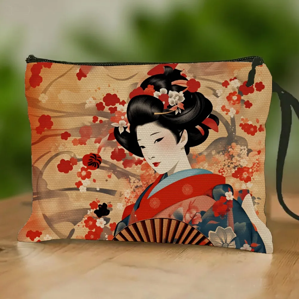 Japanese Geisha-Style Wristlet Makeup Bag with Red Blue Kimono Patterns Featuring Cherry Blossoms, Exuding Exotic Cultural Charm