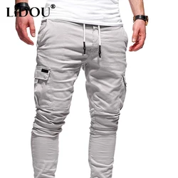 2023 Spring Autumn New Elastic Waist Pockets Drawstring Pencil Pants Man Fashion Motion Comfortable All-match Running Trousers