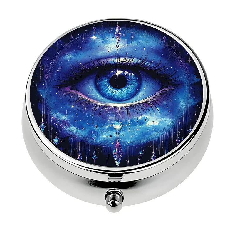 Mysterious Eye design single pill box, specially designed for travel. This compact pill box has three compartments, making it perfect for fitting into a wallet or purse, and is an ideal gift for travelers.