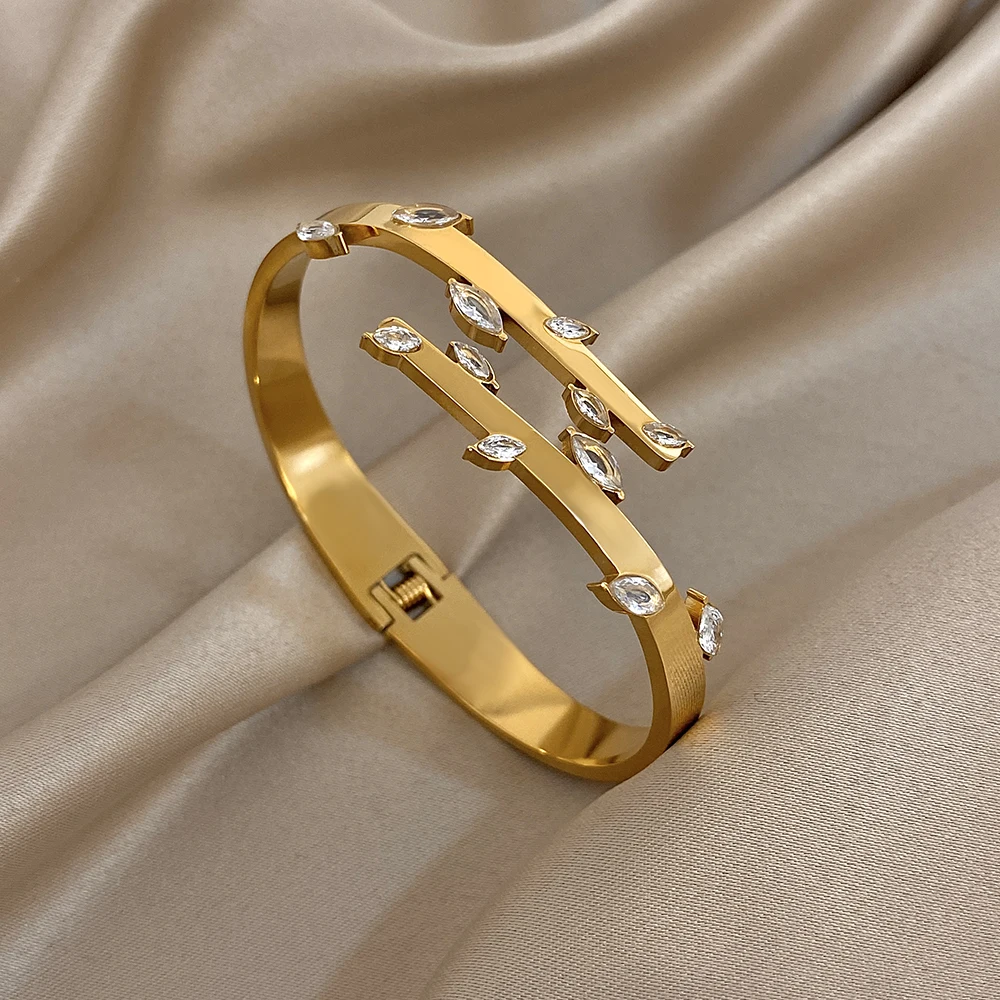 

DODOHAO Exquisite Shiny Zircon Stainless Steel Bangle Bracelet Women Creative Irregular Leaves Spring Buckle Open Bangle Gifts