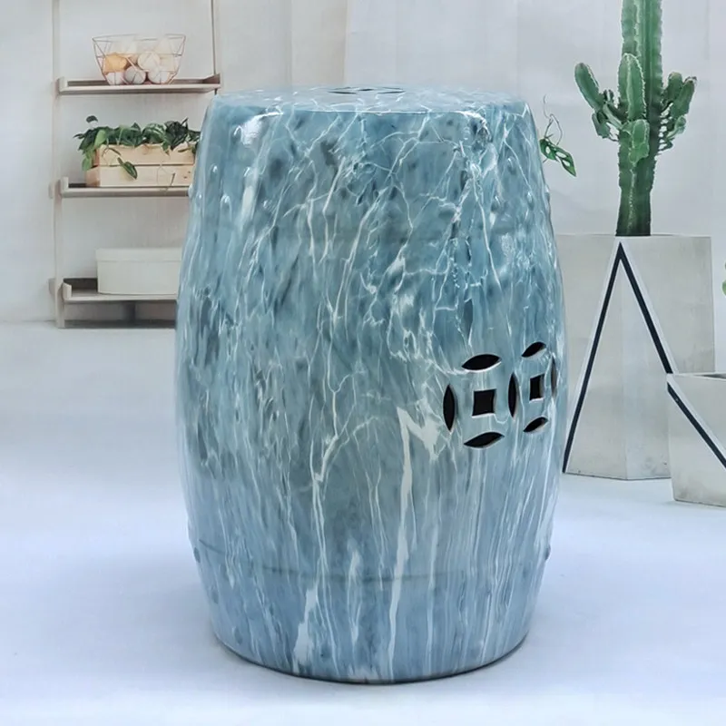 Modern Chinese-style porcelain stool, outdoor garden ceramic drum stool, silver-colored, with carved patterns, round, openwork