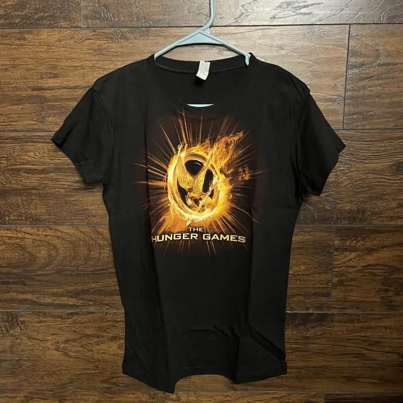 تي شيرت فيلم Hunger Games May The Odds Be In Your Favor