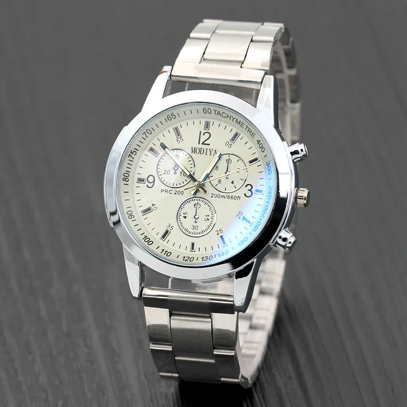 MODIYA-Reloj de tira de acero de tres ojos para hombre y mujer, accesorio decorativo de cristal con luz azul, regalo de moda para estudiantes, 2024