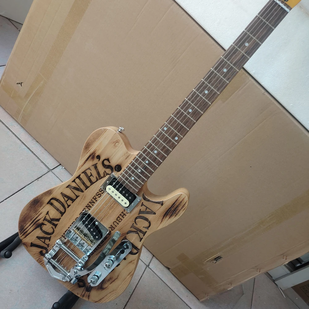 

Processing electric guitars in stock with natural wood color relics, white wax wood body, maple neck, vibrato system, fast deliv