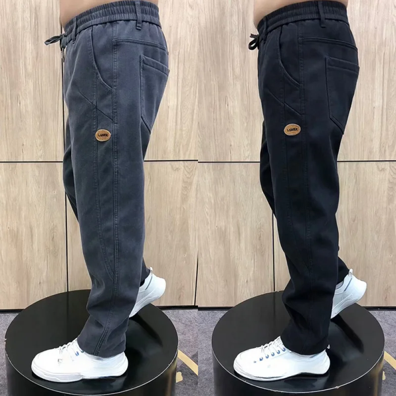 QICHE 2026 Men Plus Size Stretch Denim Jeans Loose Straight‑Leg Comfort Wear‑Resistant Casual Work Trousers