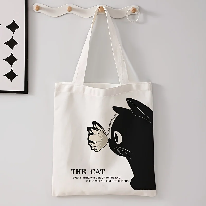 A Black Cat Butterfly printed canvas tote bag, suitable for 