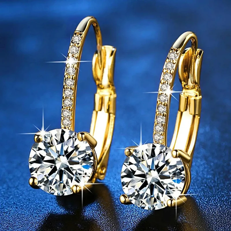 Huitan Einfache, trendige, durchbohrte Ohrringe für Damen, goldfarbener Schmuck für Verlobung, anmutige, helle Zirkonia-Accessoires für den Alltag