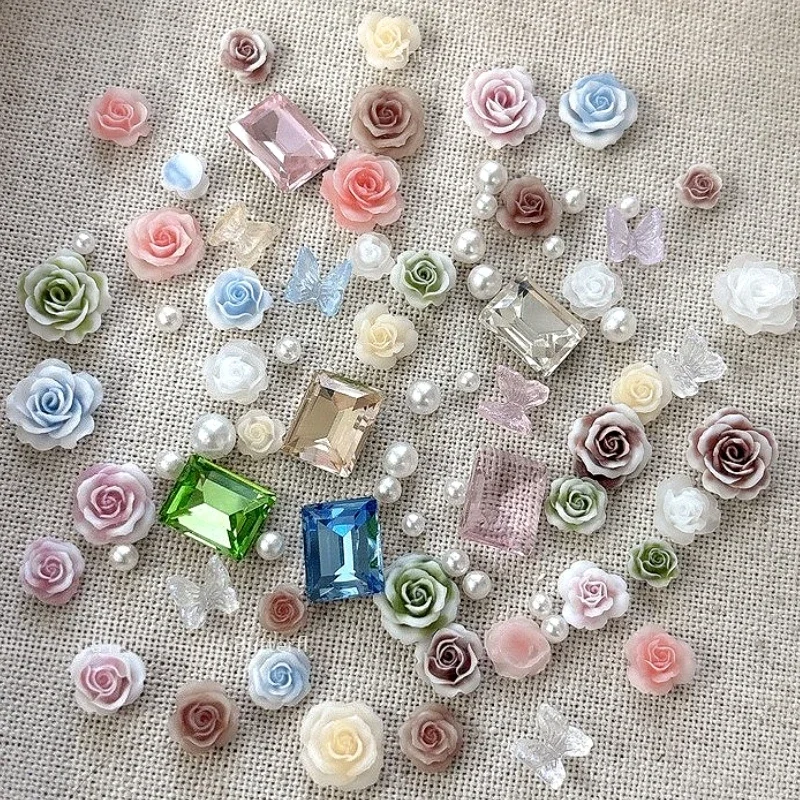 カラフルなローズ椿の花パールクリスタルラインストーン蝶ちょう結びドリル DIY ネイルアートデコレーションセットマニキュアアクセサリー
