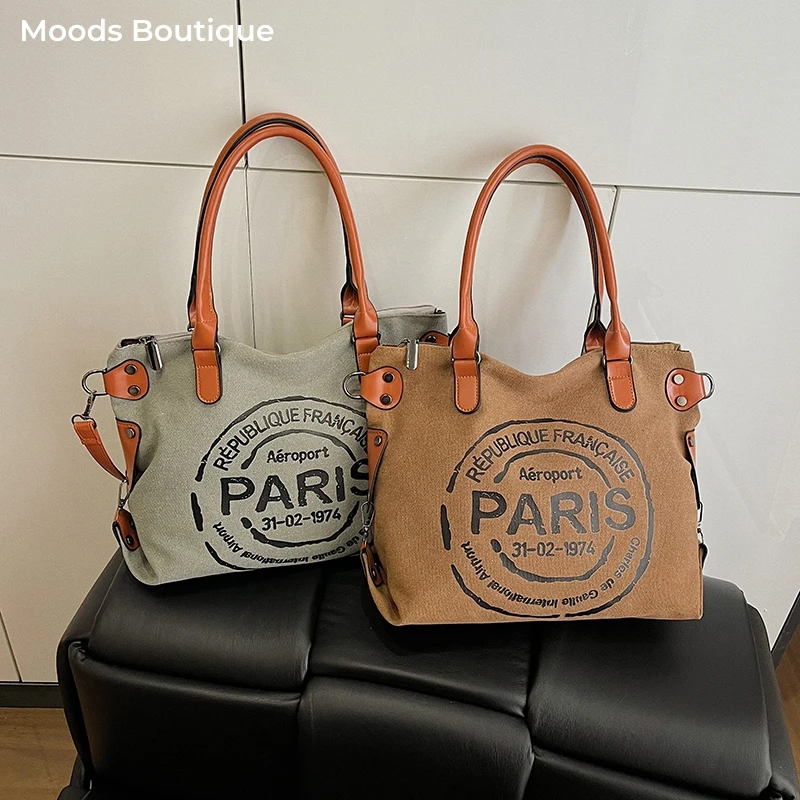 

Letter Printed Canvas Fabric Shoulder Cross Body Bags For Women Large Capacity Shopping Totes 2026 New Style Commuter Handbags