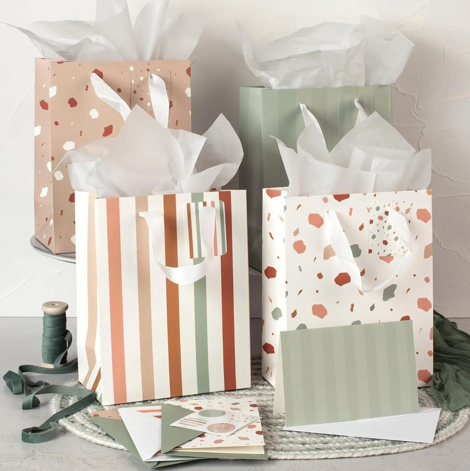 

Gift Bags Set of 4 - Medium Sized 9' Bags with Handles incl. Matching Tissue Paper, Cards & Small Stickers - Reusable &
