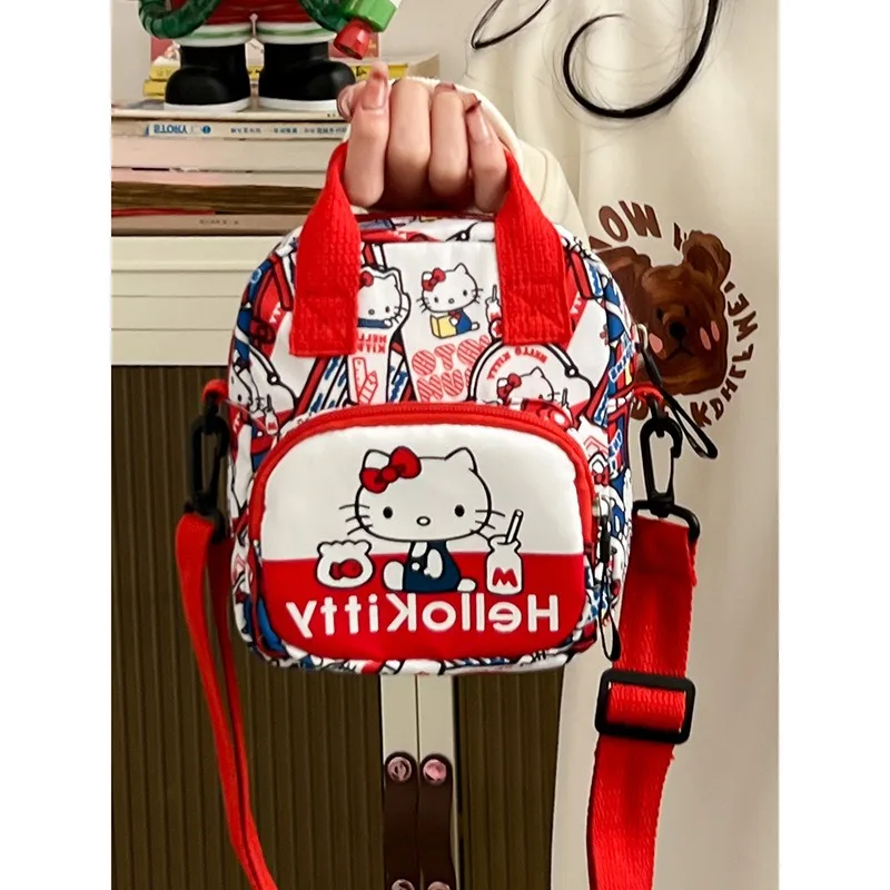 MBTI Hello Kitty torba na ramię damska mała styl japoński moda nadruk kreskówkowy torba Crossbody nylonowa śliczna damska torebka na monety