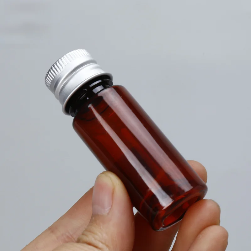 20 مل زجاجة بلاستيكية شفافة بغطاء لولبي وغطاء ألومنيوم ضغط حاوية توزيع كاشف مقاومة للضوء