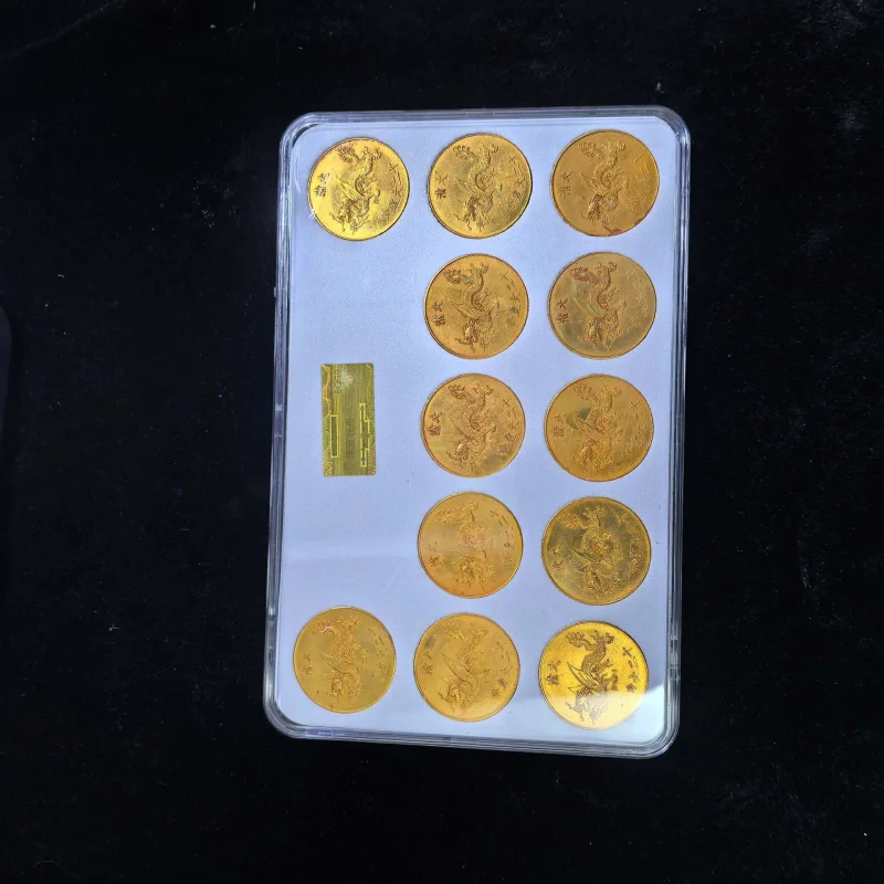 Complete of of twelve emperors of the Qing Dynasty, graded for collection, gilded silver coins, a set