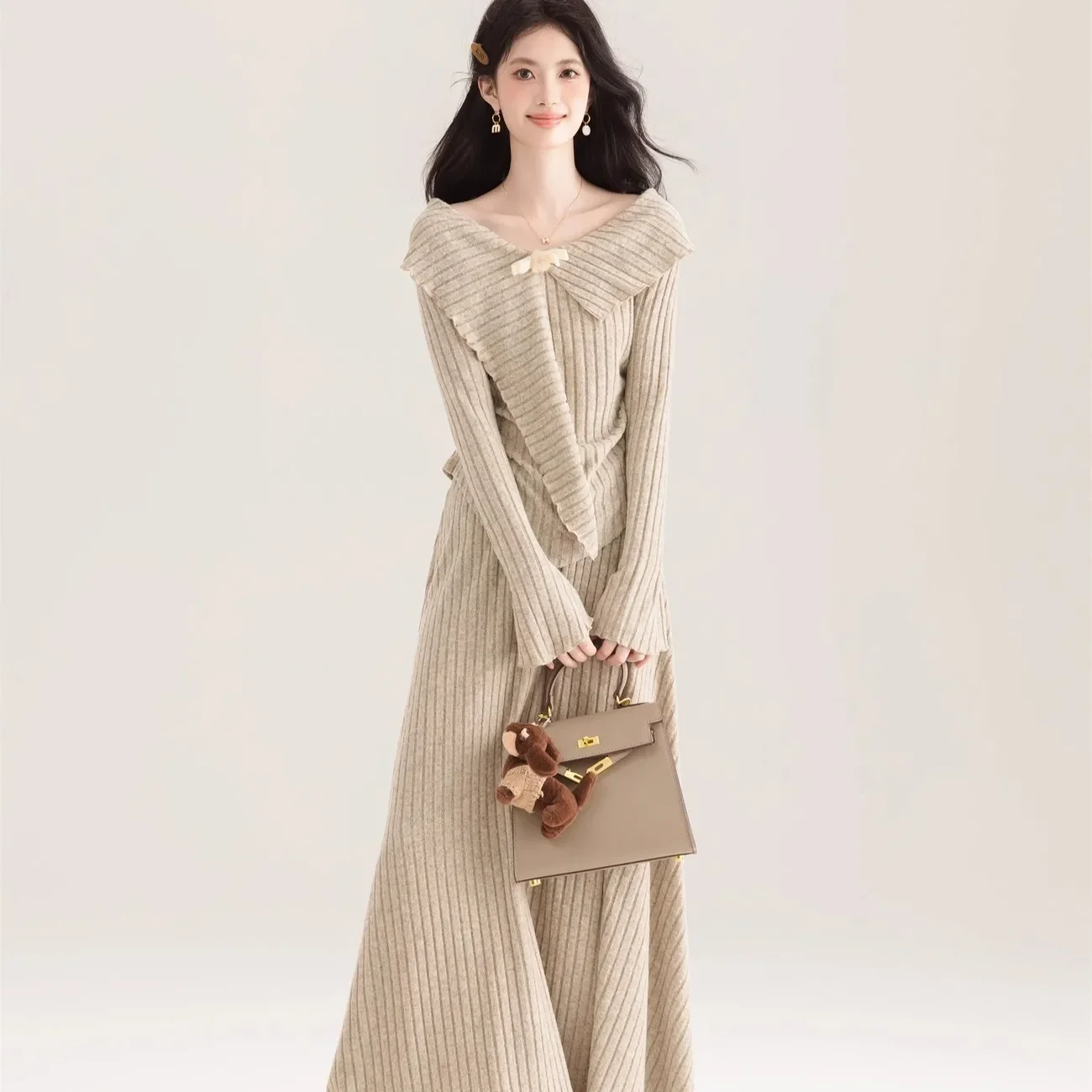 

French Spring and Autumn 2026 Elegant Suit New Irregular Top High Waist Long Skirt Two-piece Set