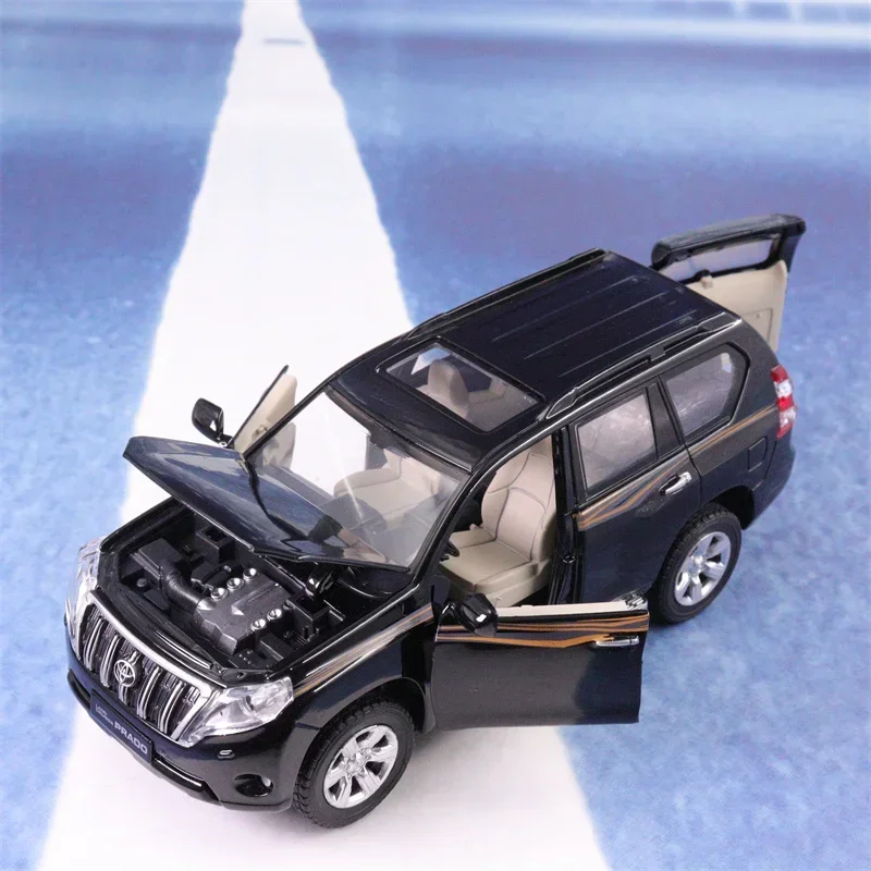 1:32 TOYOTA LAND CRUISER PRADO จำลอง Diecast โลหะผสมรุ่นรถเสียงดึงกลับคอลเลกชันของขวัญสำหรับเด็ก A177