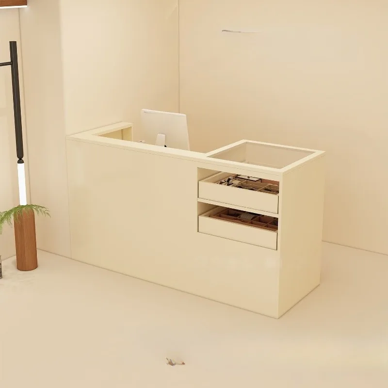 Clothing store checkout page Antique display cabinet Glass bar Women's clothing store Small front desk counter reception