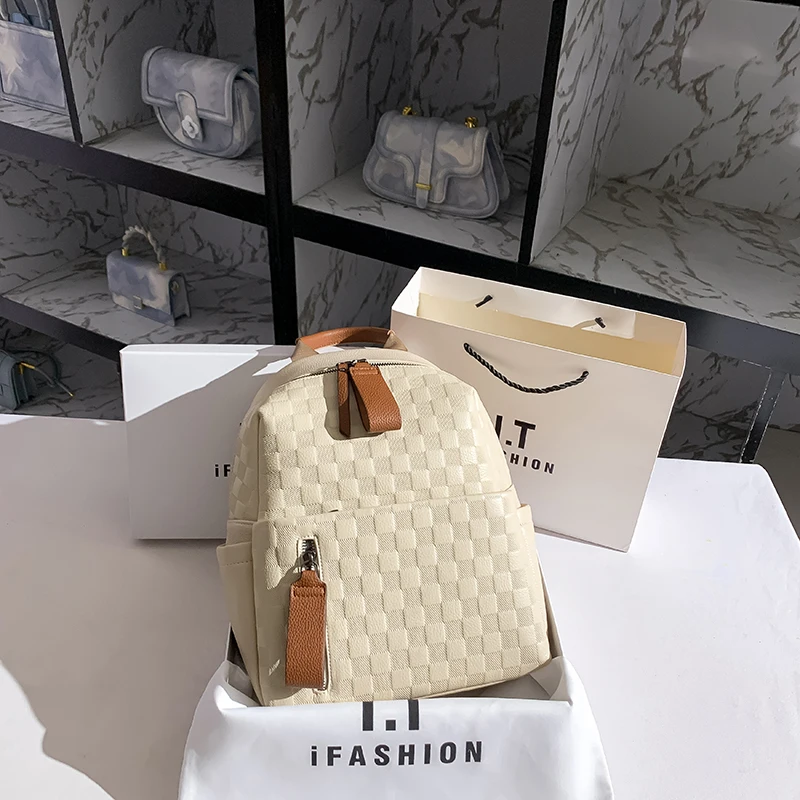 高級レザーレディースバックパック香港トラベルバッグ大容量トレンディなデザインのダブルショルダーバッグ女性のためのカジュアルレジャー