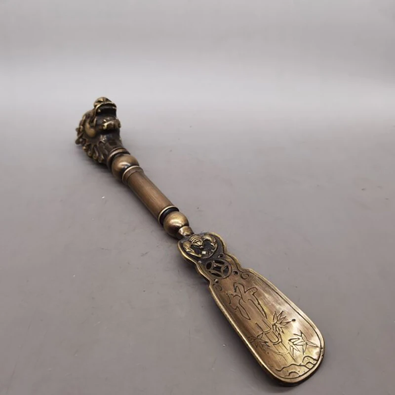 dragon head , home decoration, antique collectible, brass longevity star shoehorn, decorative craft