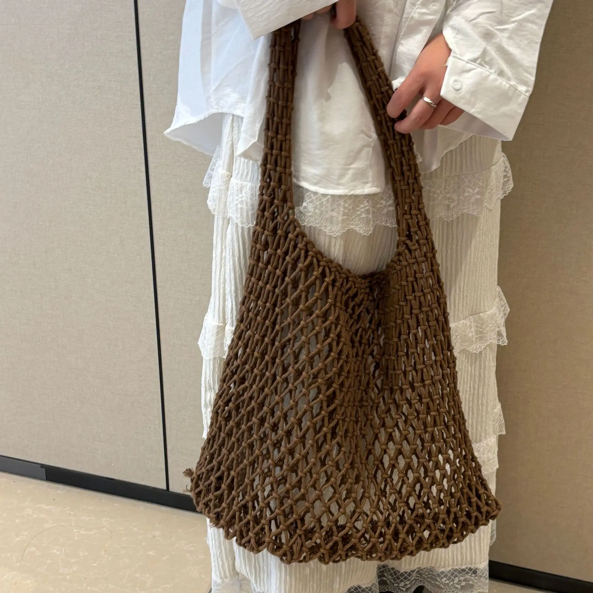 

Beach Hollow Handbag for Women Rope Hollow Out Hand Woven Knitting Handbag Purses Bags for Women 2026 Summer