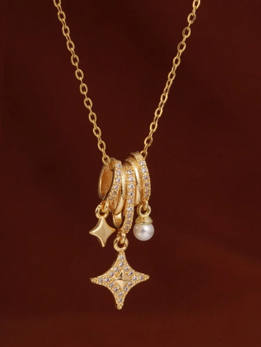 

Gold-Tone Layered Pendant Necklace with Zirconia Stars and Pearl Charm