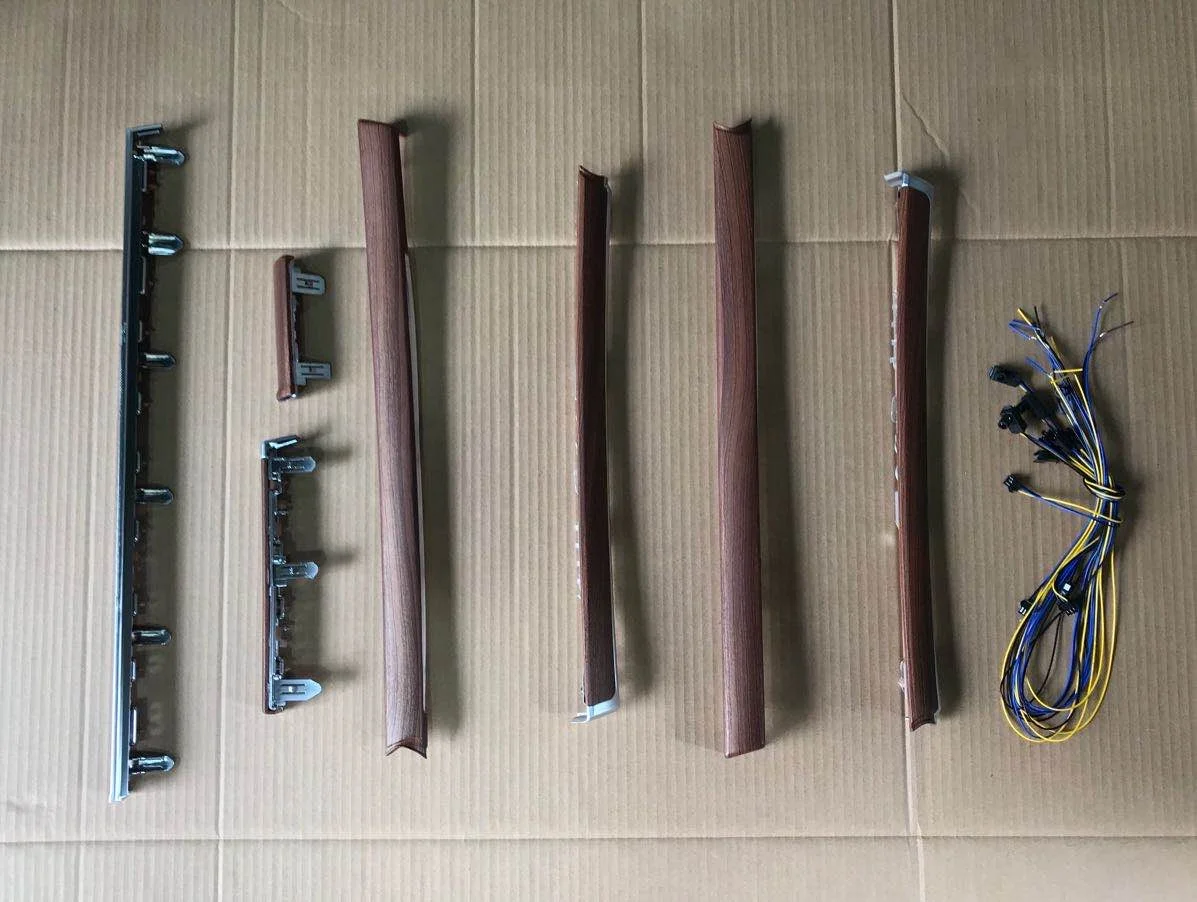 

For the 2016-2018 Land Cruiser new models, the interior wood is light/dark in color