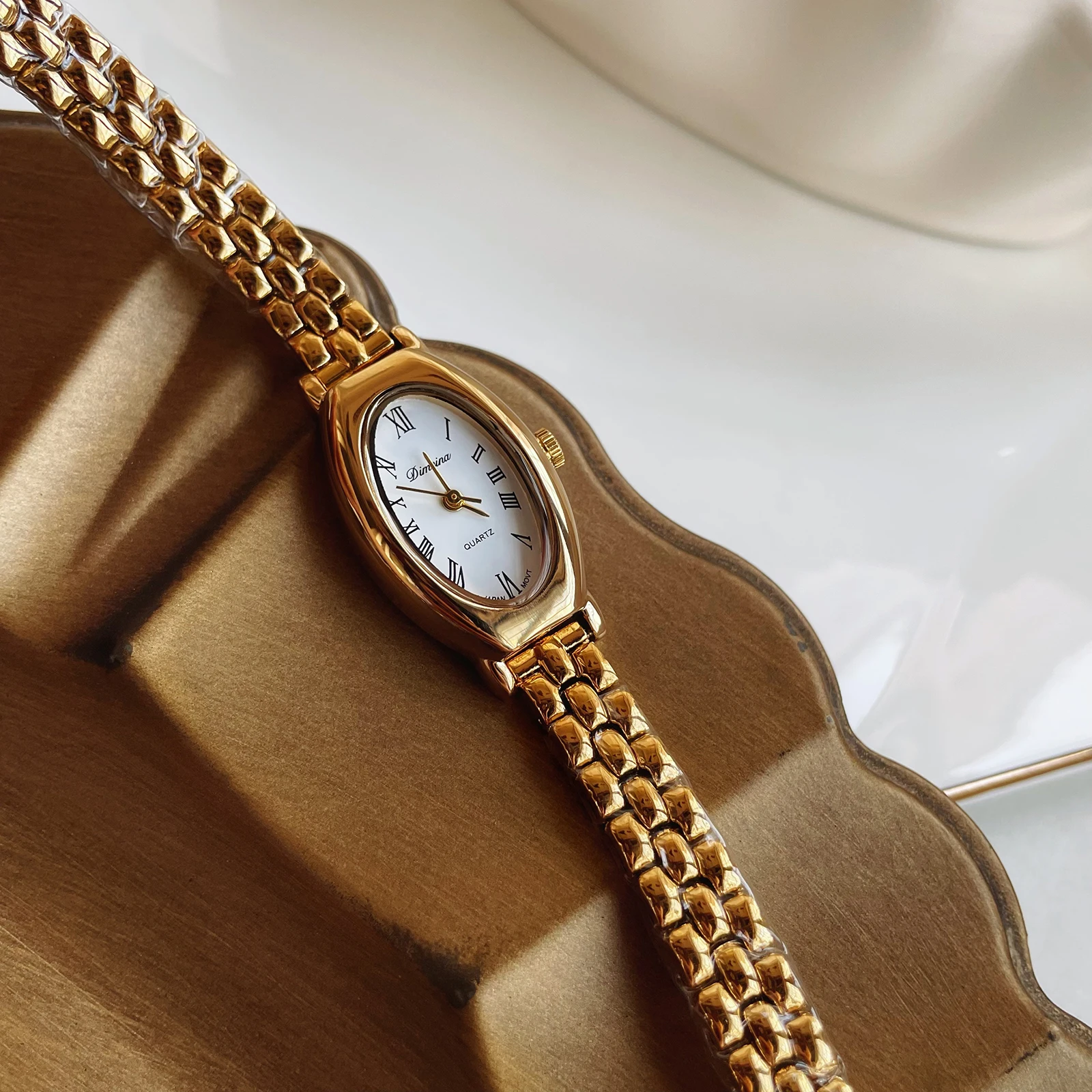 

Elegant women's wristwatch, classic style, small gold watch, slender oval shape, vintage quartz women's watch, birthday gift.