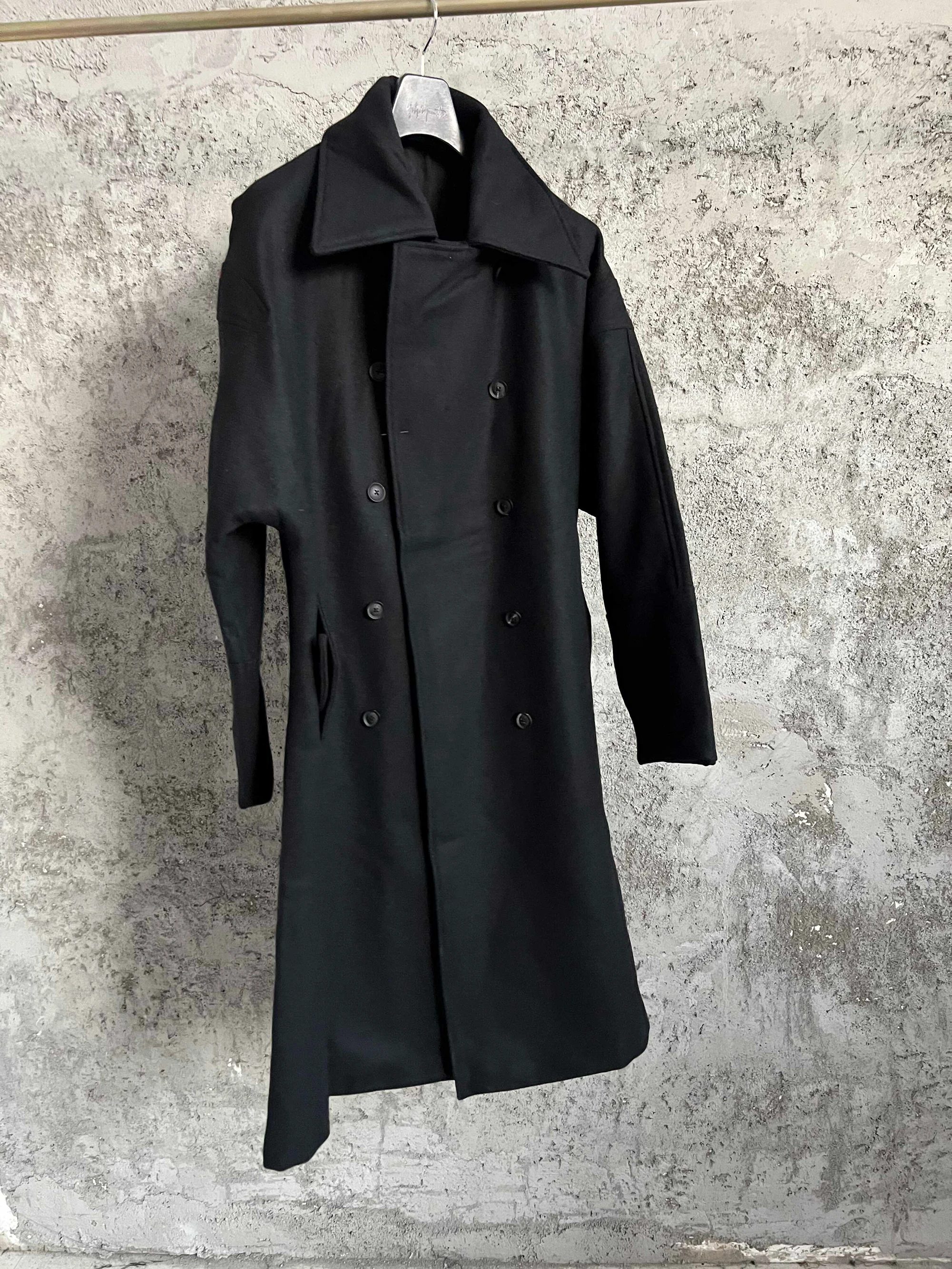 

TOP-YAMAMOTO is a niche Japanese designer brand of wool coats for the elderly with embroidered backrests