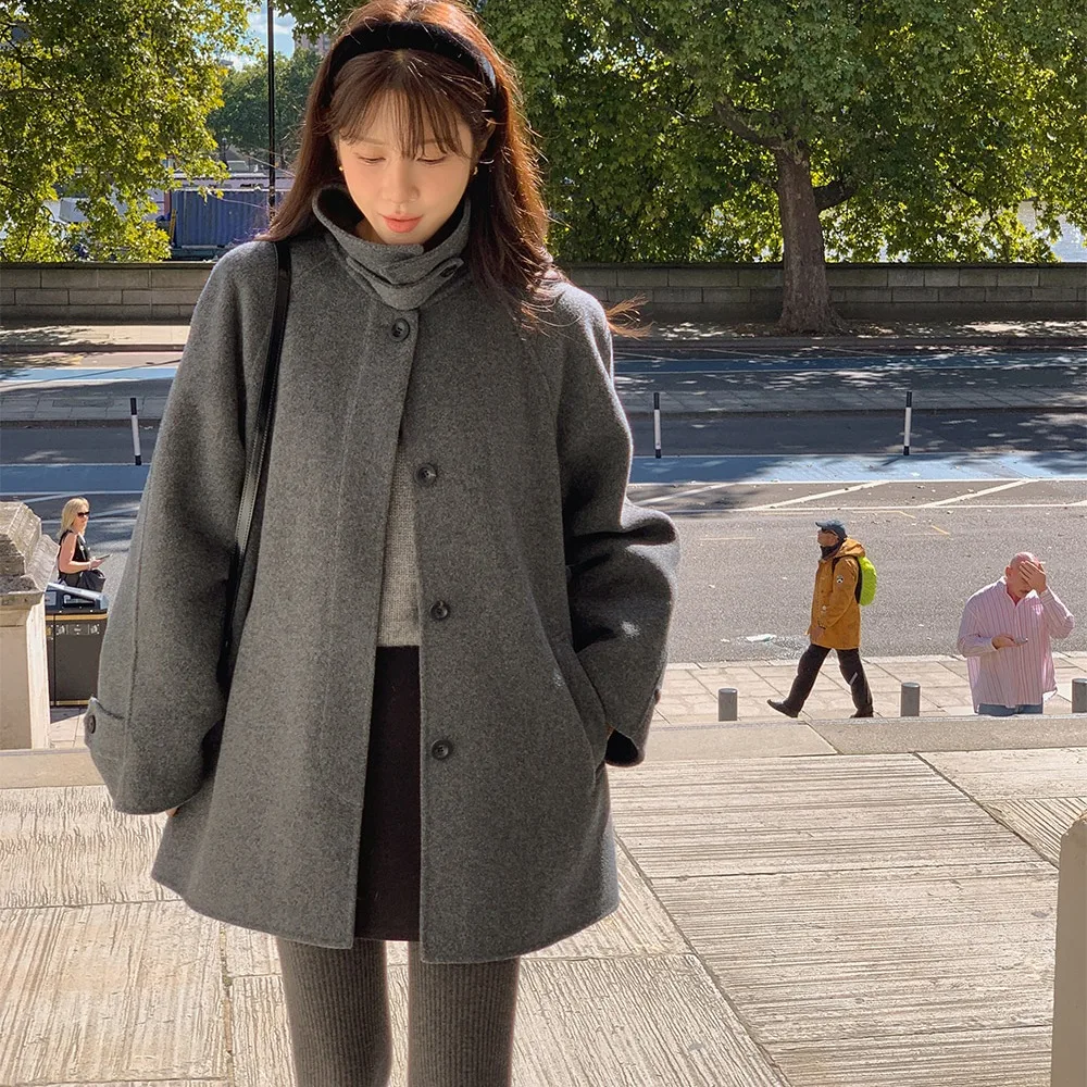 

Шикарное шерстяное пальто для женщин с воротником-стойкой и асимметричным дизайном с разрезом на пуговицах средней длины для поездок на работу Long Sve Pure Color