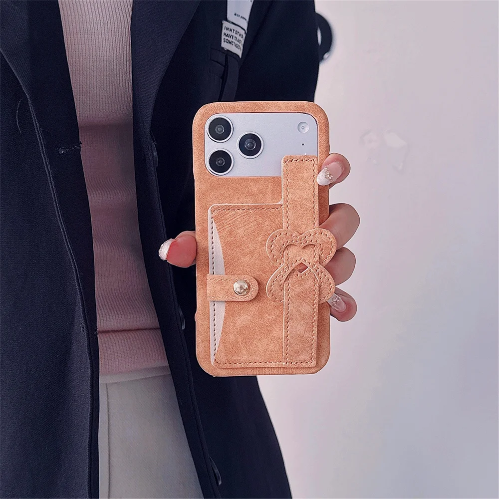 

17 Pro Max Vintage Heart Knot Soft Suede Texture Phone Case for iPhone 16 15 14 13 Pro Chic Card Slot Wallet Wrist Strap Cover