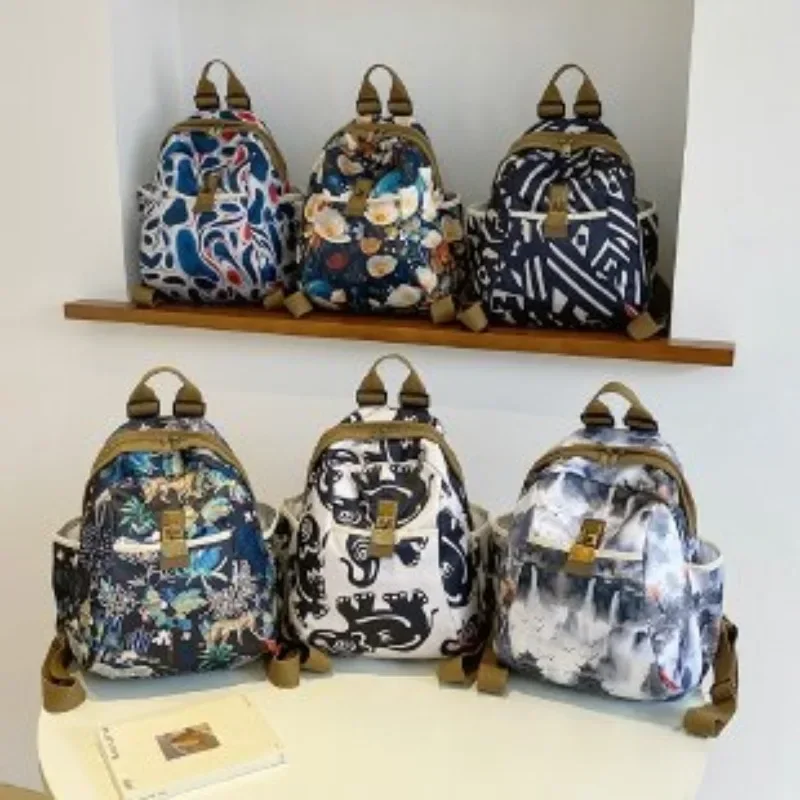 

Новый женский школьный рюкзак большой вместимости из ткани Оксфорд, Лидер продаж 2025 года, модный универсальный рюкзак, модные повседневные дорожные сумки с принтом