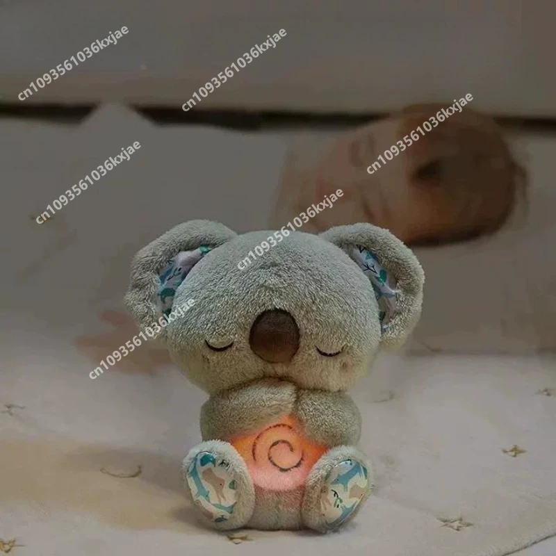

Stuffed Animal Koala Plush Sleep Aid with Soft Glow Night Light Calming Music Simulated Breathing Comforting Bedtime Comfort Toy