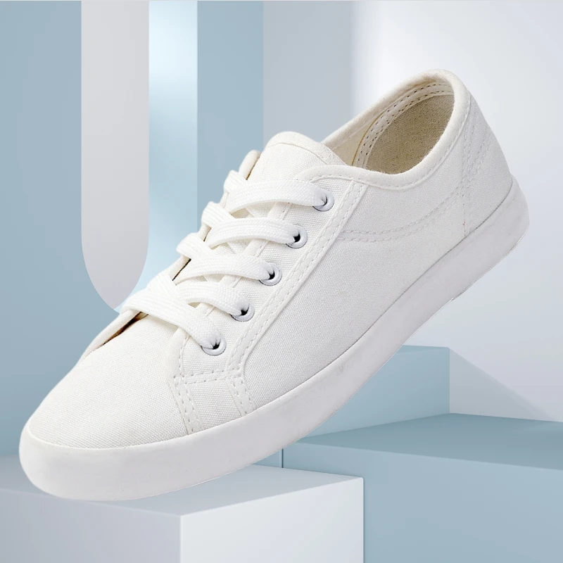Zapatos blancos de lona bajos para mujer, zapatillas sencillas transpirables con cordones para estudiantes, zapatos cómodos para parejas, zapatillas deportivas para el día