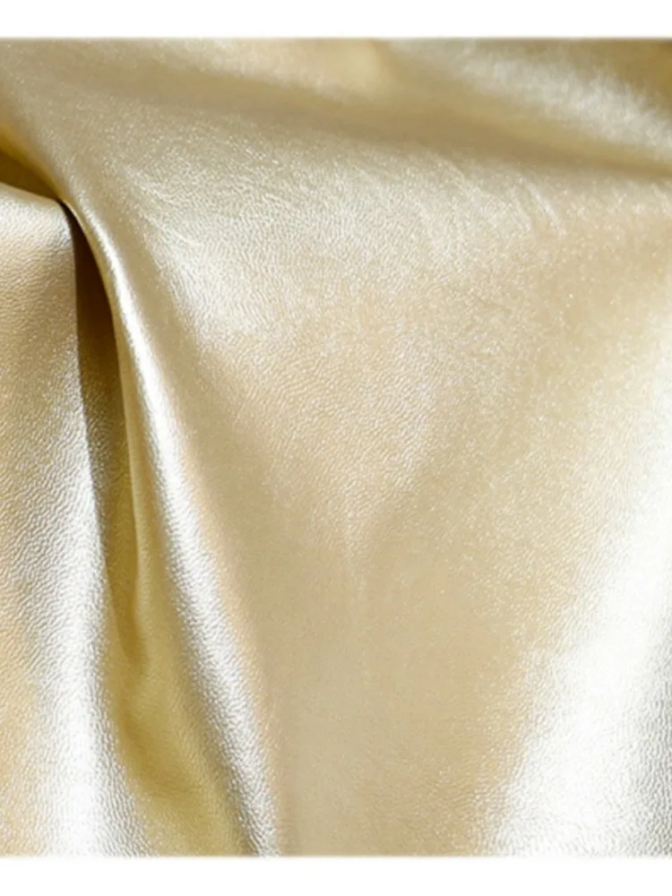 PU Leather Fabric Fine Grain Skin Champagne Gold Soft Leather Elastic Free Clothing Designer Fabric Cloth Apparel Sewing