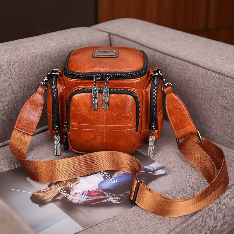 

2025 New Leather Women Bag Fashionable Retro Multi-pocket Barrel-shaped Single-shoulder Crossbody Large-capacity Camera Package
