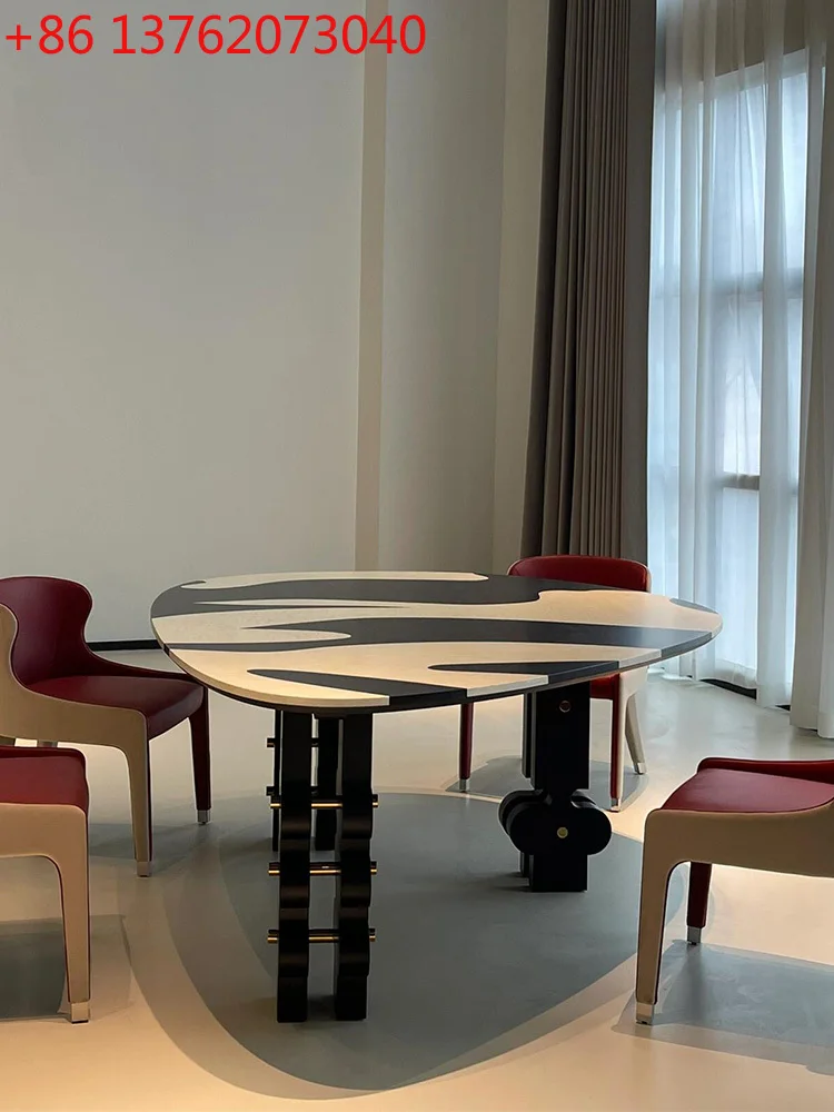 

The medieval style designer model is hand-painted special-shaped irregular solid wood dining table, and the Italian minimalist