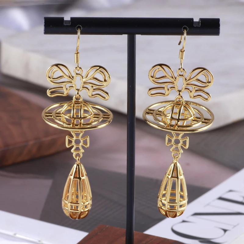 أقراط على شكل فيونكة مجوفة من HQ للسيدات من النحاس المطلي بالذهب بتصميم قطرات الماء أقراط عصرية مخصصة إكسسوارات فاخرة هدايا