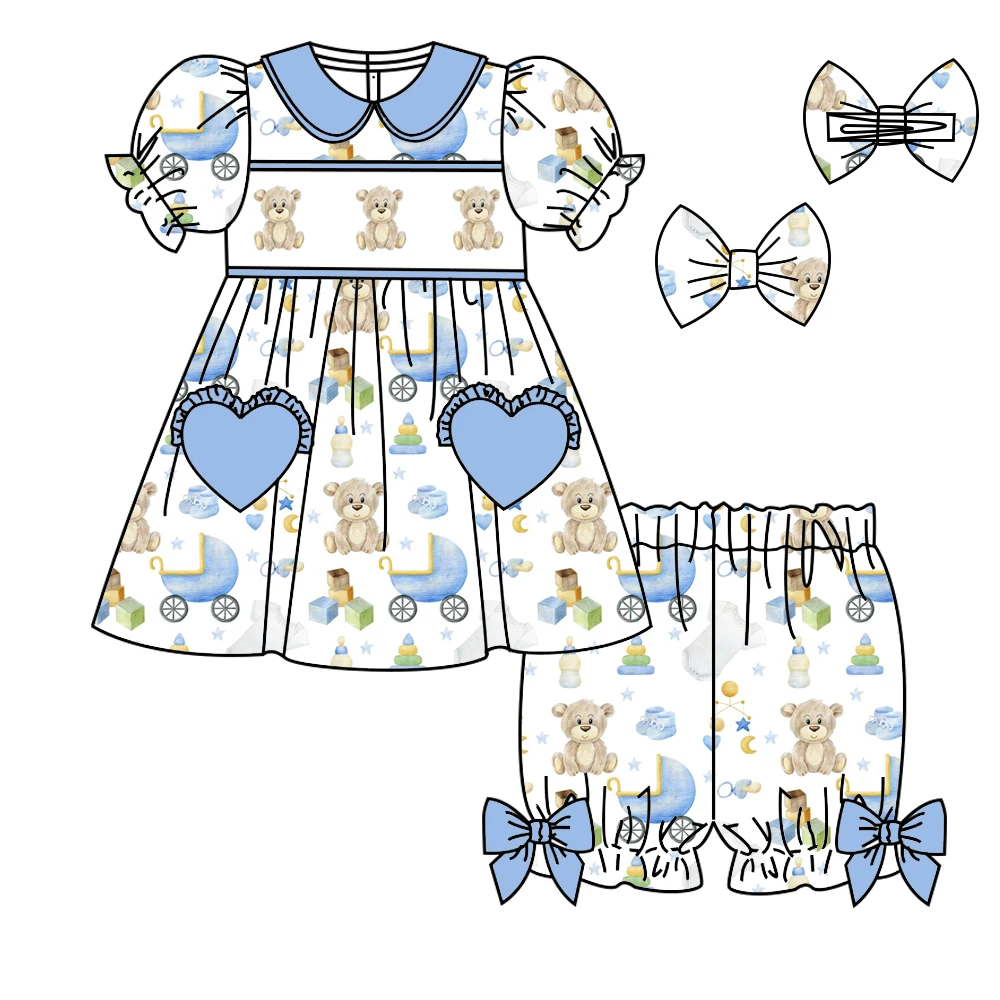 

Fashion boutique children's clothing blue short-sleeved cartoon doll building block print shorts pajamas set bow
