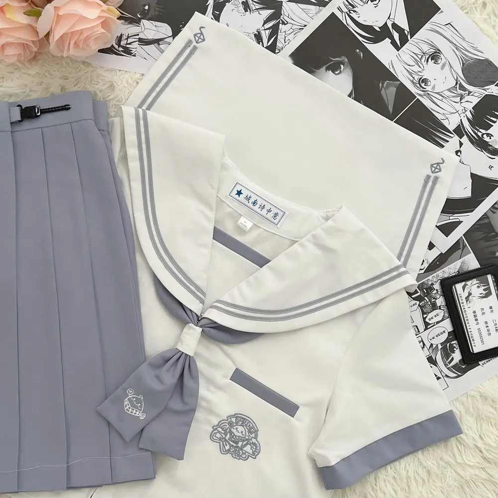 2024 giapponese grigio bianco abbinato al colore JK uniforme lunga manica corta top gonna a pieghe estate delle donne ragazze carine uniforme da marinaio