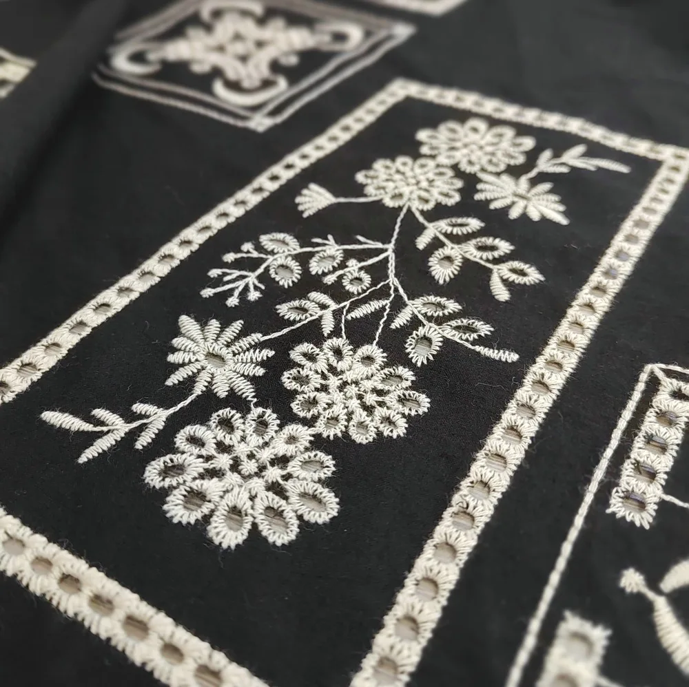 Vintage black base all-cotton fabric with apricot-colored cotton rope floral embroidery for clothing accessories