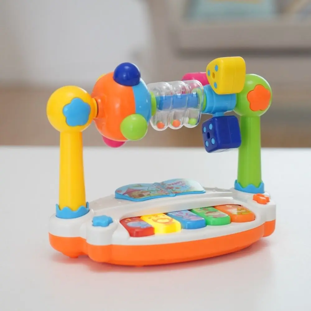 Suono leggero Giocattoli per pianoforte per bambini Stampa animale rotante Tastiera musicale per bambini Tipo di gioco Regalo giocattolo musicale per bambini in età prescolare