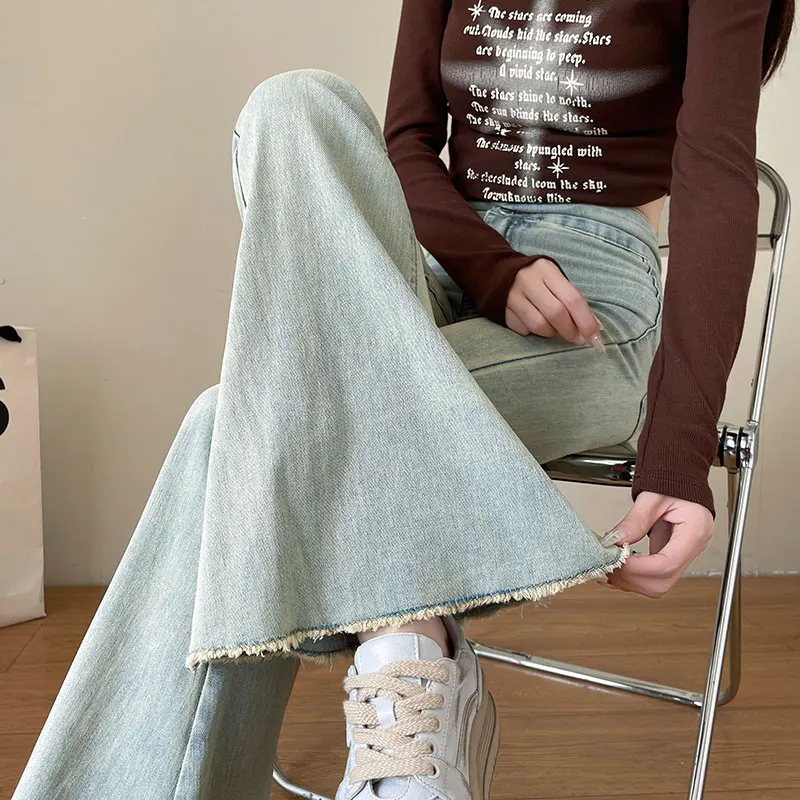 Streetwear Moda Donna Flare Jeans divisi Vita alta Fascia elastica Denim Pantaloni completi estivi Pantaloni dritti casual sottili Wh4