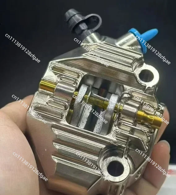 A pair of MOTO3 calipers made in china