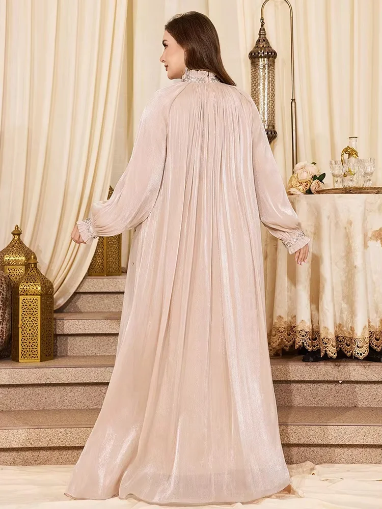 High neck long sleeve modest floor-length gown, crafted with sheer tulle fabric and flowy skirt. Custom sizes available. Elegant