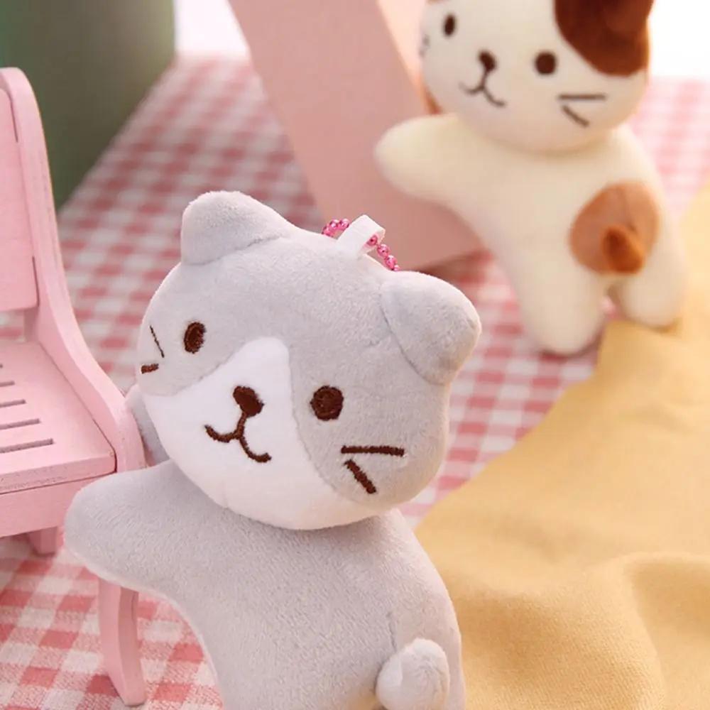 Boucle de clé chat mignon en peluche pendentif sac à dos breloques en peluche tête tordue chaton porte-clés Style coréen dessin animé poupée pendentif
