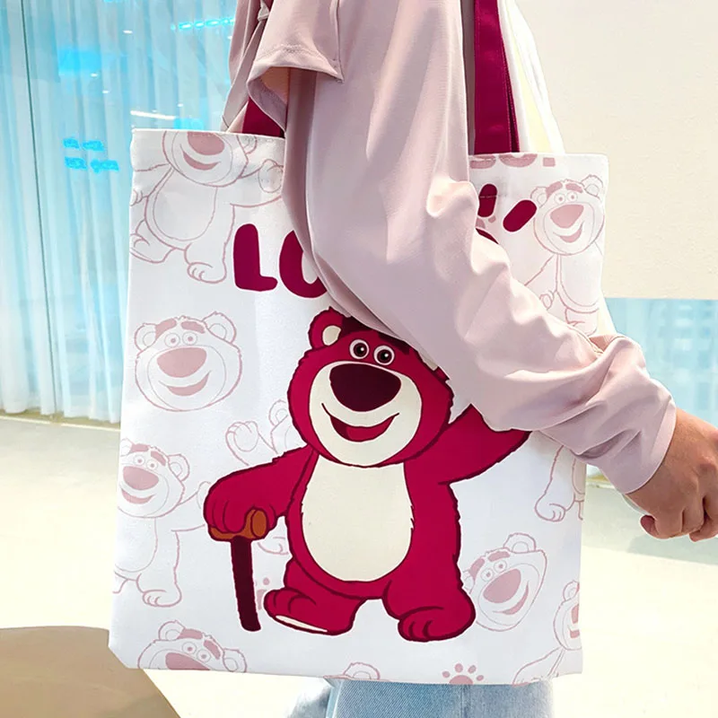 

Disney lotso cartoon carrying canvas bag Cute strawberry bear emoji bill shoulder bag,