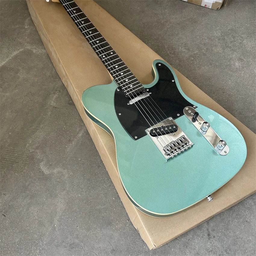 

In stock, double edged, blue green color, ALDER wood electric guitar, free shipping, wholesale and retail